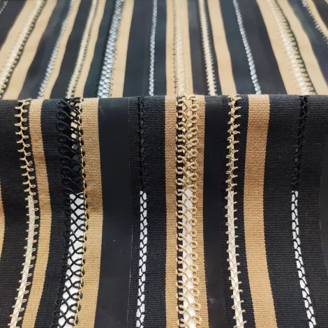 embroidery with vertical stripes gold black white